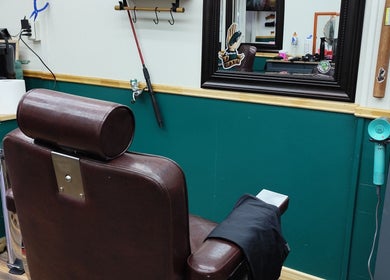 Silla de barbería en José Perdomo Barbero Concepto, Puerto Montt, Los Lagos, CL. Ambiente elegante y acogedor.