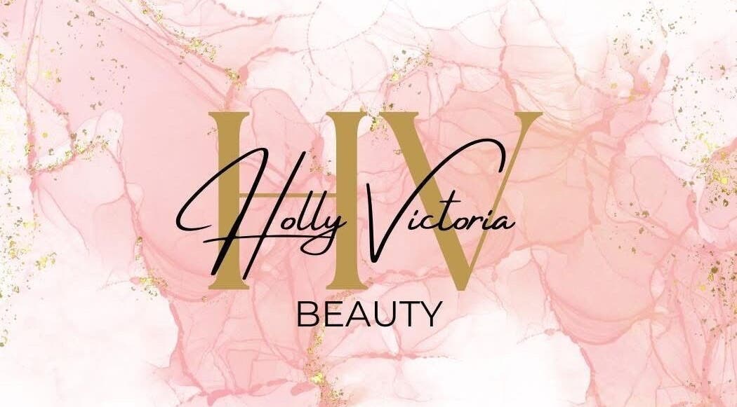 Holly Victoria Beauty logo with pink marble background in King's Sutton, England, GB.