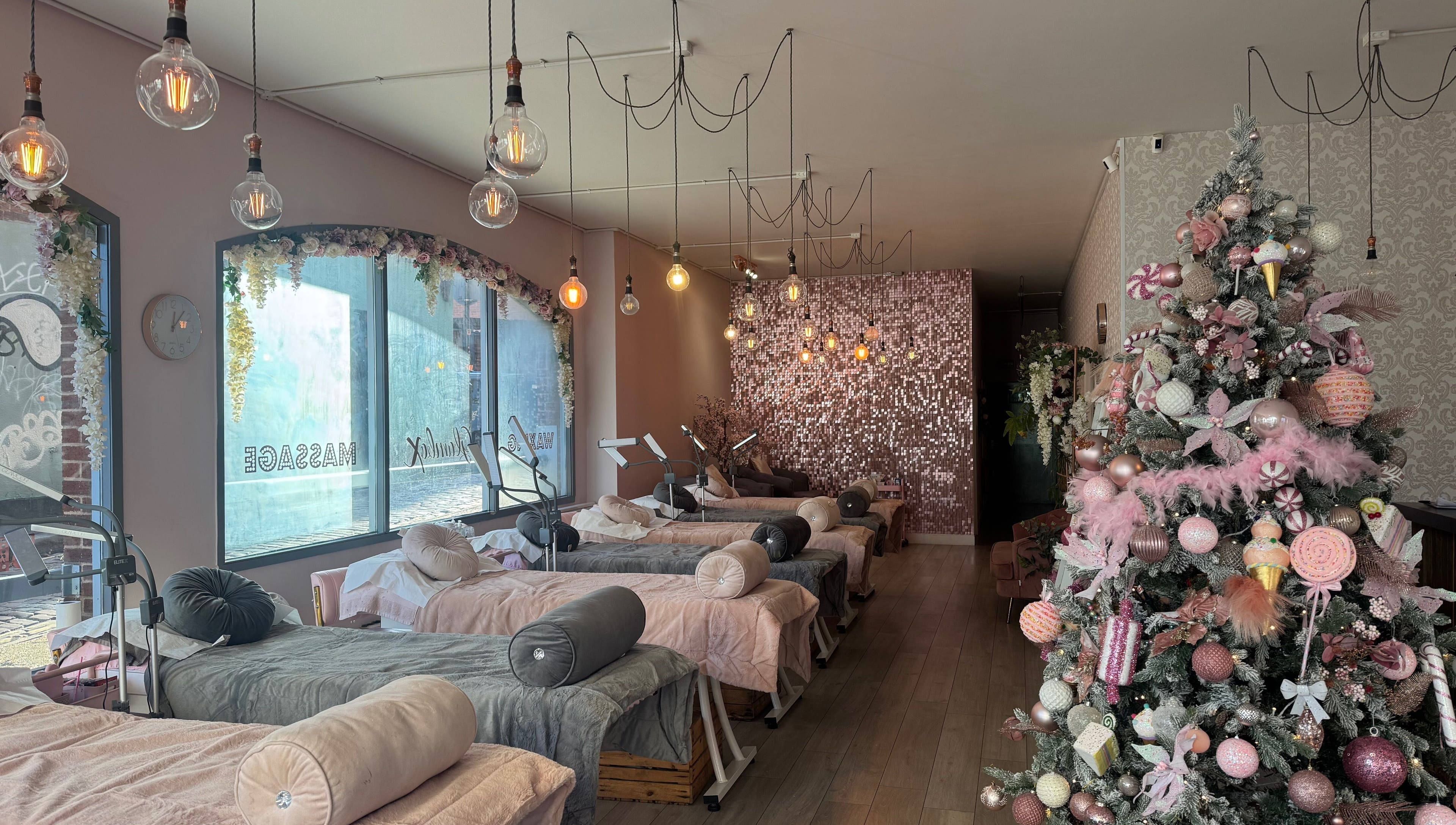 Luxurious beauty space at Glambox, Norwich, England, GB, featuring elegant decor and plush spa beds.
