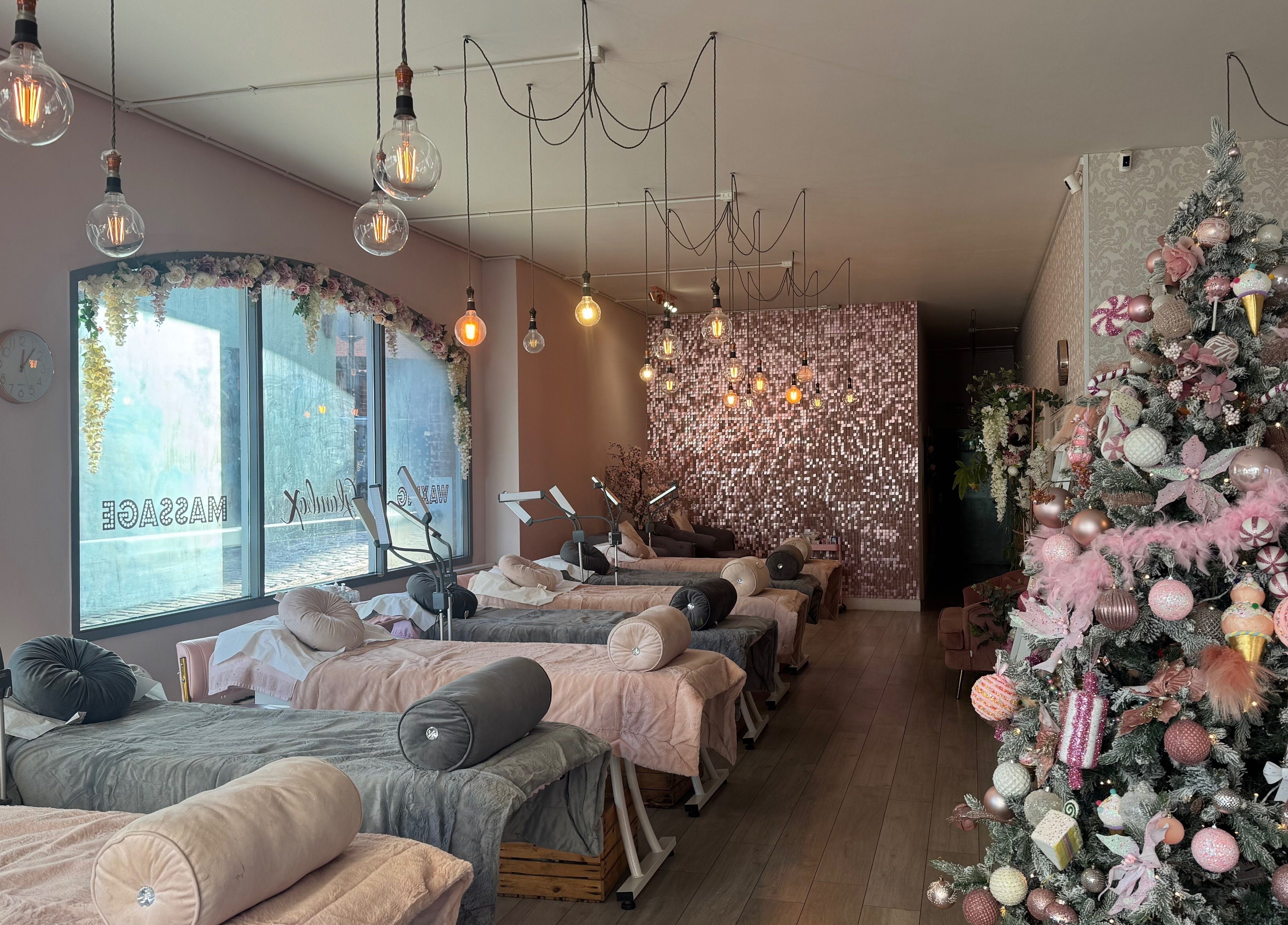 Luxurious beauty space at Glambox, Norwich, England, GB, featuring elegant decor and plush spa beds.