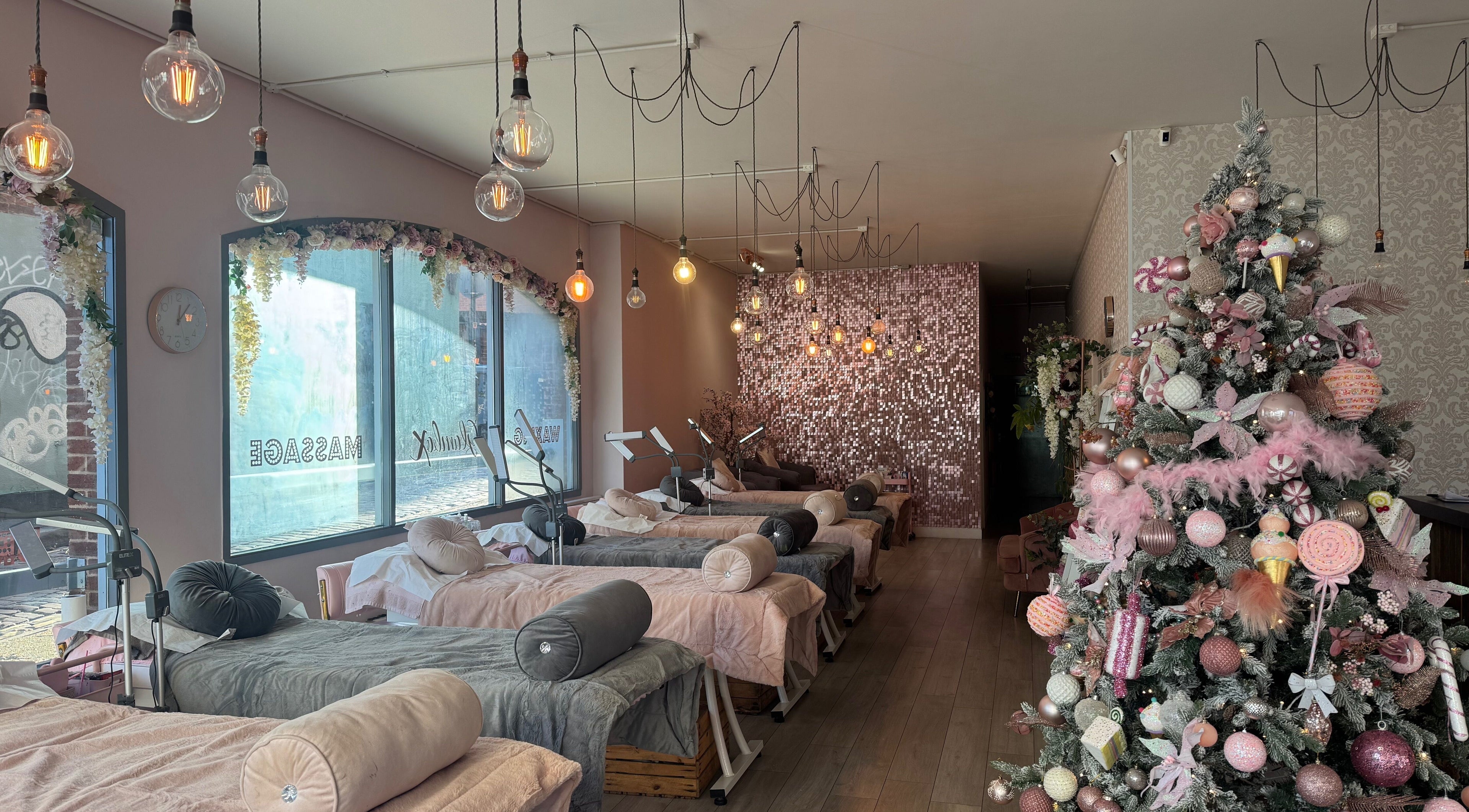 Luxurious beauty space at Glambox, Norwich, England, GB, featuring elegant decor and plush spa beds.