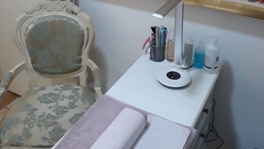 Elegant nail station at Pretty Nails Nottingham, Arnold, England, GB, featuring chic chair and manicure tools.