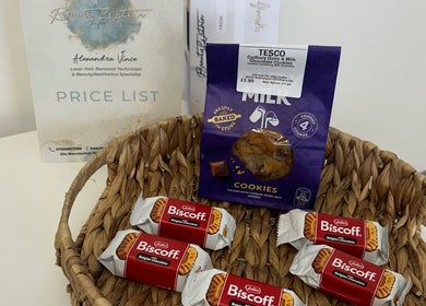 Tease 2 venue in Hazel Grove, England offers a basket of cookies and treats for clients' relaxation.