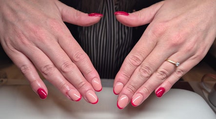 Beautiful nail art at Nails with Love, featuring red and nude tones. Located in Willenhall, England, GB.