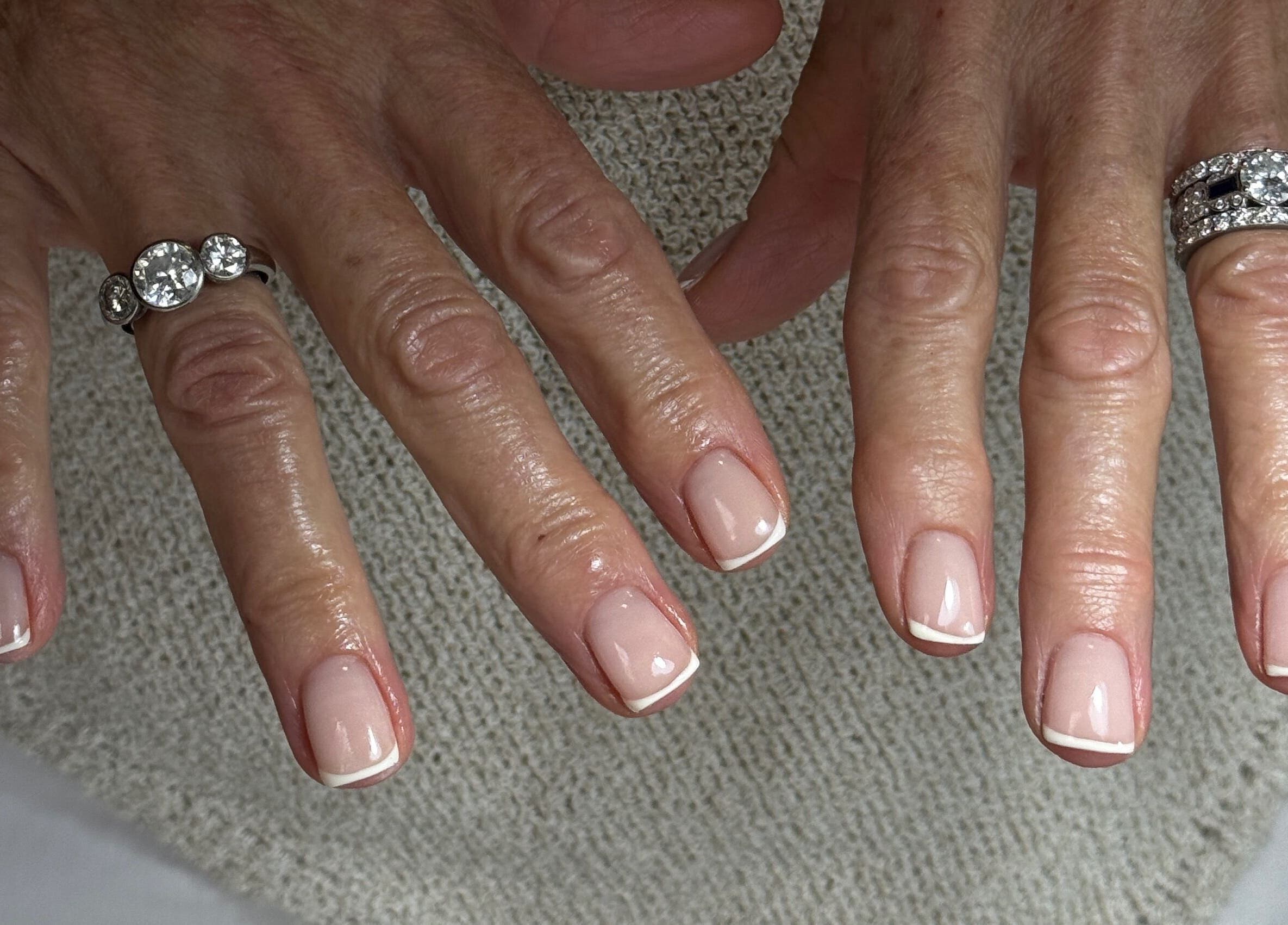 Elegant manicure with classic French tips at Fabulous Nails, Melbourne, Victoria, AU.