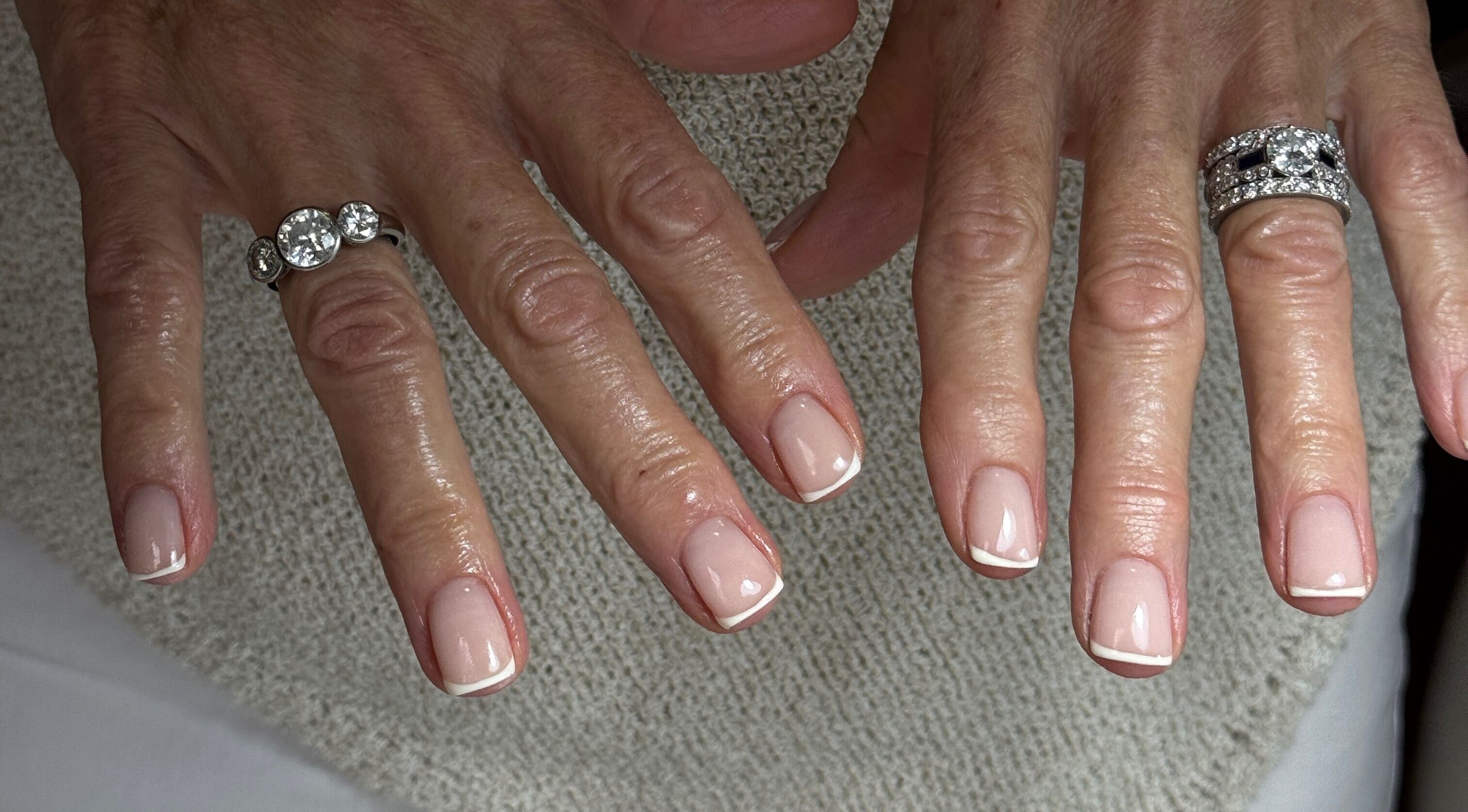 Elegant manicure with classic French tips at Fabulous Nails, Melbourne, Victoria, AU.