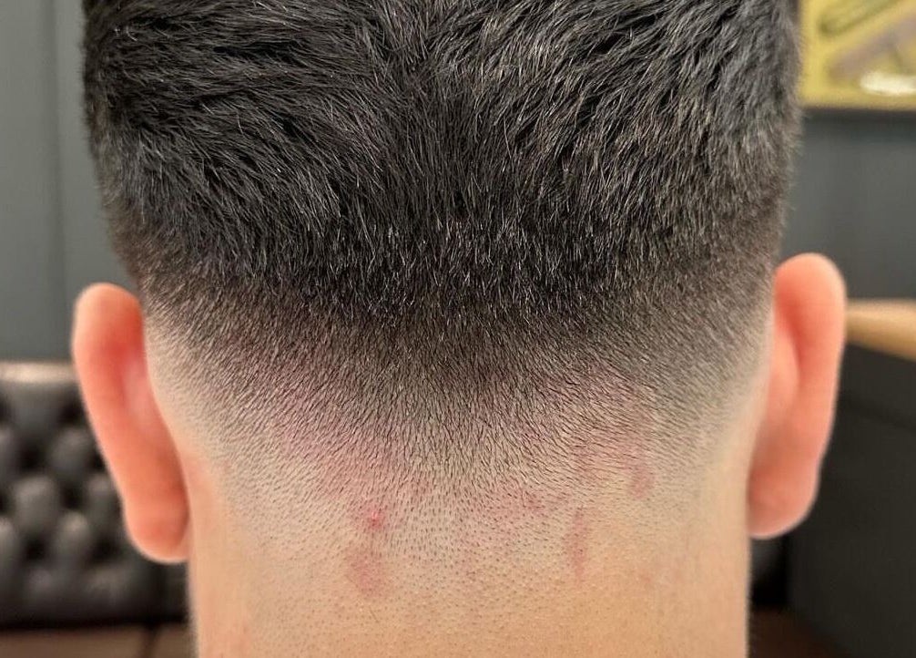 Close-up av fade-hårklipp på NAJIBBR i Stavanger, Rogaland, NO.