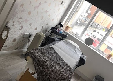 Serene treatment room at Rock Candy Beauty in Louth, England, GB, with calming decor and natural light.