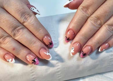 Stylish nail art at Rock Candy Beauty, Louth, England, GB showcasing intricate ghost and spider designs.