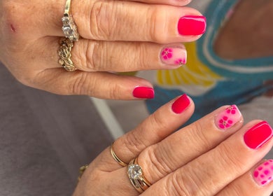 Vibrant floral nail art showcased at Rock Candy Beauty, Louth, England, GB.