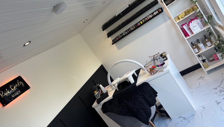 Modern nail station at Rock Candy Beauty, Louth, England, GB showcasing luxurious beauty products.
