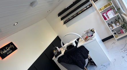 Modern nail station at Rock Candy Beauty, Louth, England, GB showcasing luxurious beauty products.