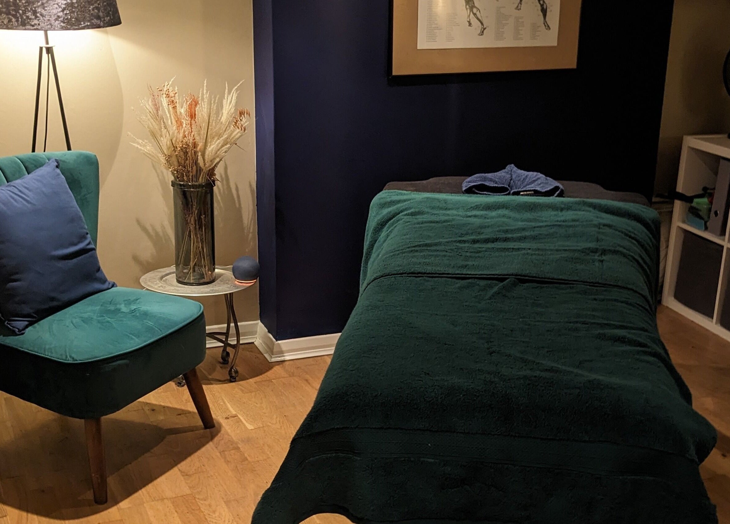Cozy massage room at Reviving Harmony, London. Check emails for booking info before travel. England, GB.