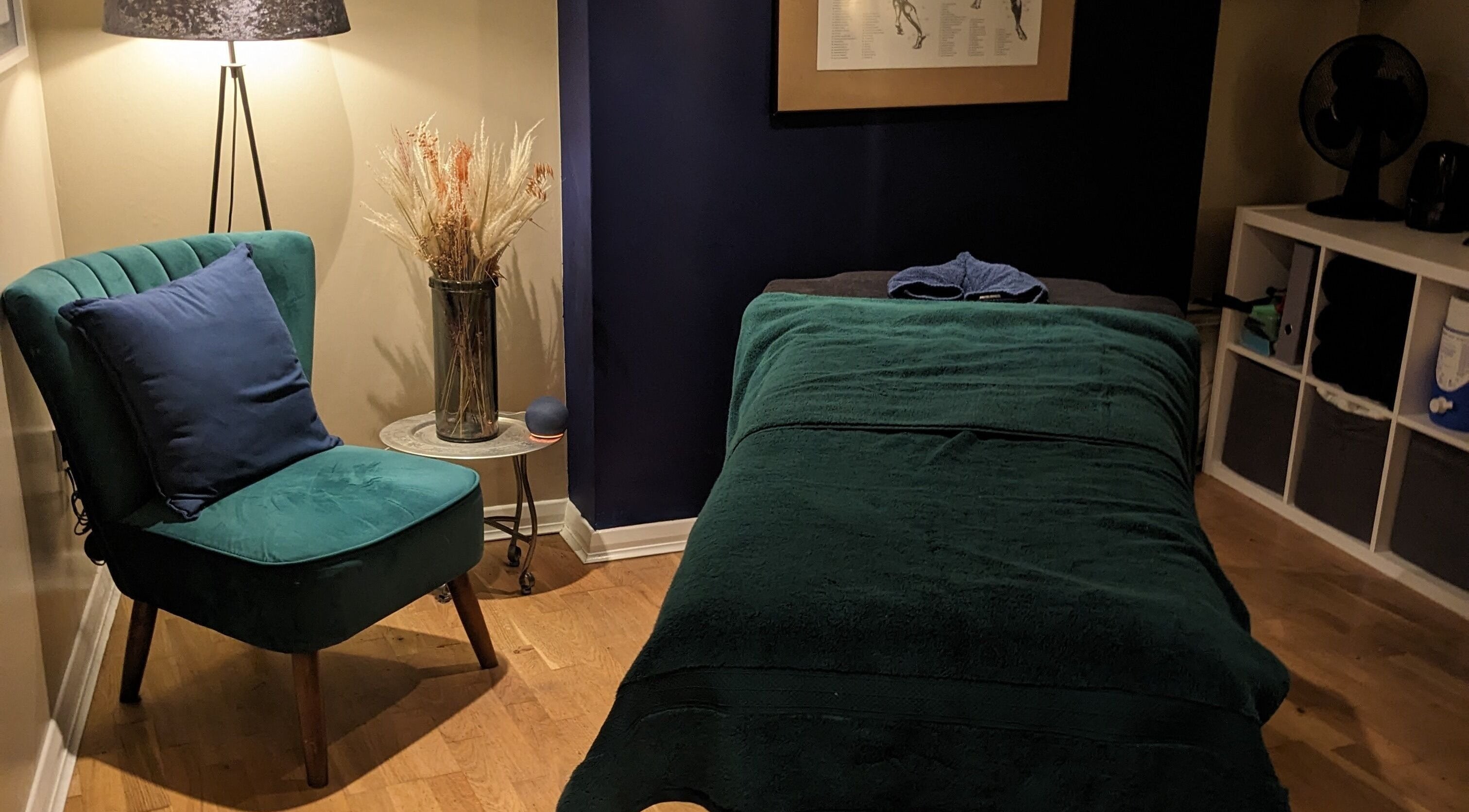Cozy massage room at Reviving Harmony, London. Check emails for booking info before travel. England, GB.