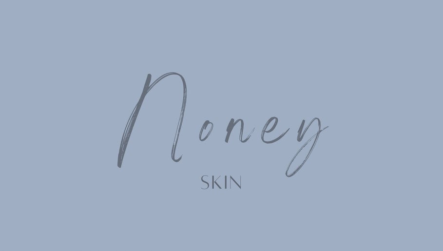 Noney Skin's elegant logo on a serene blue background in Glasgow, Scotland, GB.