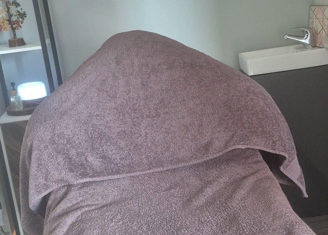 Cozy massage bed at Holistic Healing Hands, Lurgan, Northern Ireland, GB, offering a tranquil retreat.