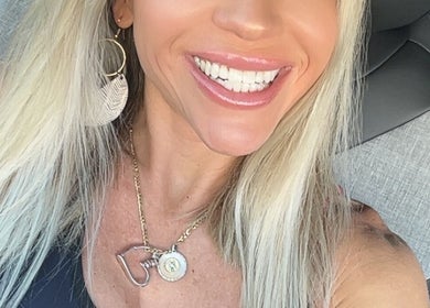 Close-up of a smiling woman showcasing Results-AZ Chandler location ambiance in Chandler, Arizona, US.