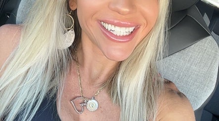 Close-up of a smiling woman showcasing Results-AZ Chandler location ambiance in Chandler, Arizona, US.