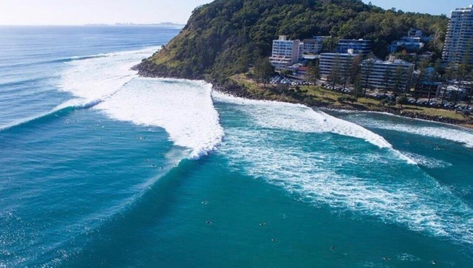 Aerial view of Burleigh Heads waves near Happy Head Spa, Burleigh Heads, Queensland, AU.