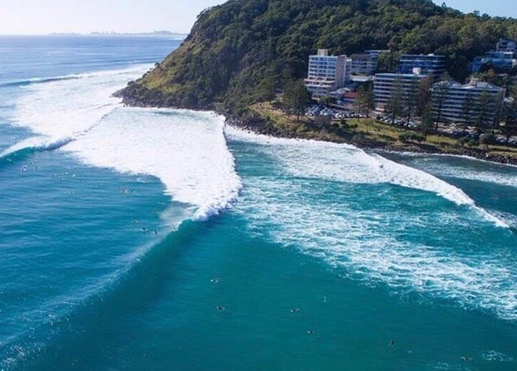 Aerial view of Burleigh Heads waves near Happy Head Spa, Burleigh Heads, Queensland, AU.