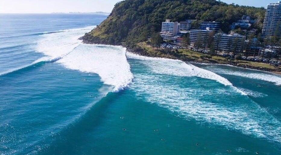 Aerial view of Burleigh Heads waves near Happy Head Spa, Burleigh Heads, Queensland, AU.