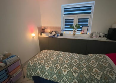 Relaxing treatment room at Namaste Swindon Beauty Services by Reema, Swindon, England, GB, with calming decor.