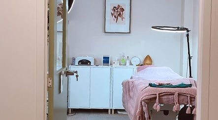 Treatment room at Si Beauty Sydney in Balgowlah, New South Wales, AU with cozy decor and professional equipment.