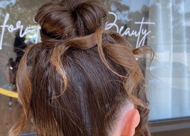 Stylish hair updo at Moss Hair Artistry, Neutral Bay, New South Wales, AU.