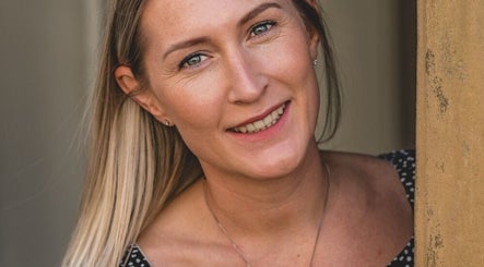 Smiling person at The Reflexology Co - Crewkerne (Church Street Wellness), Crewkerne, England, GB.