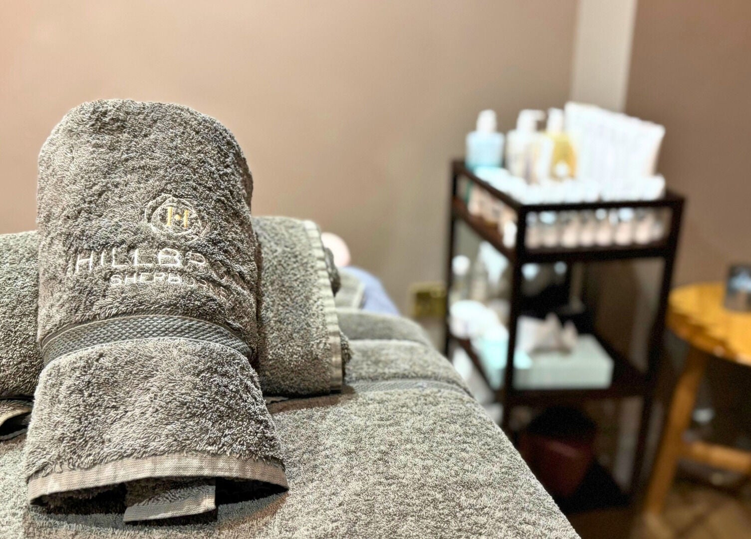 Plush towels at The Hillbrook, Sherborne, England, GB, showcasing a serene spa ambiance.