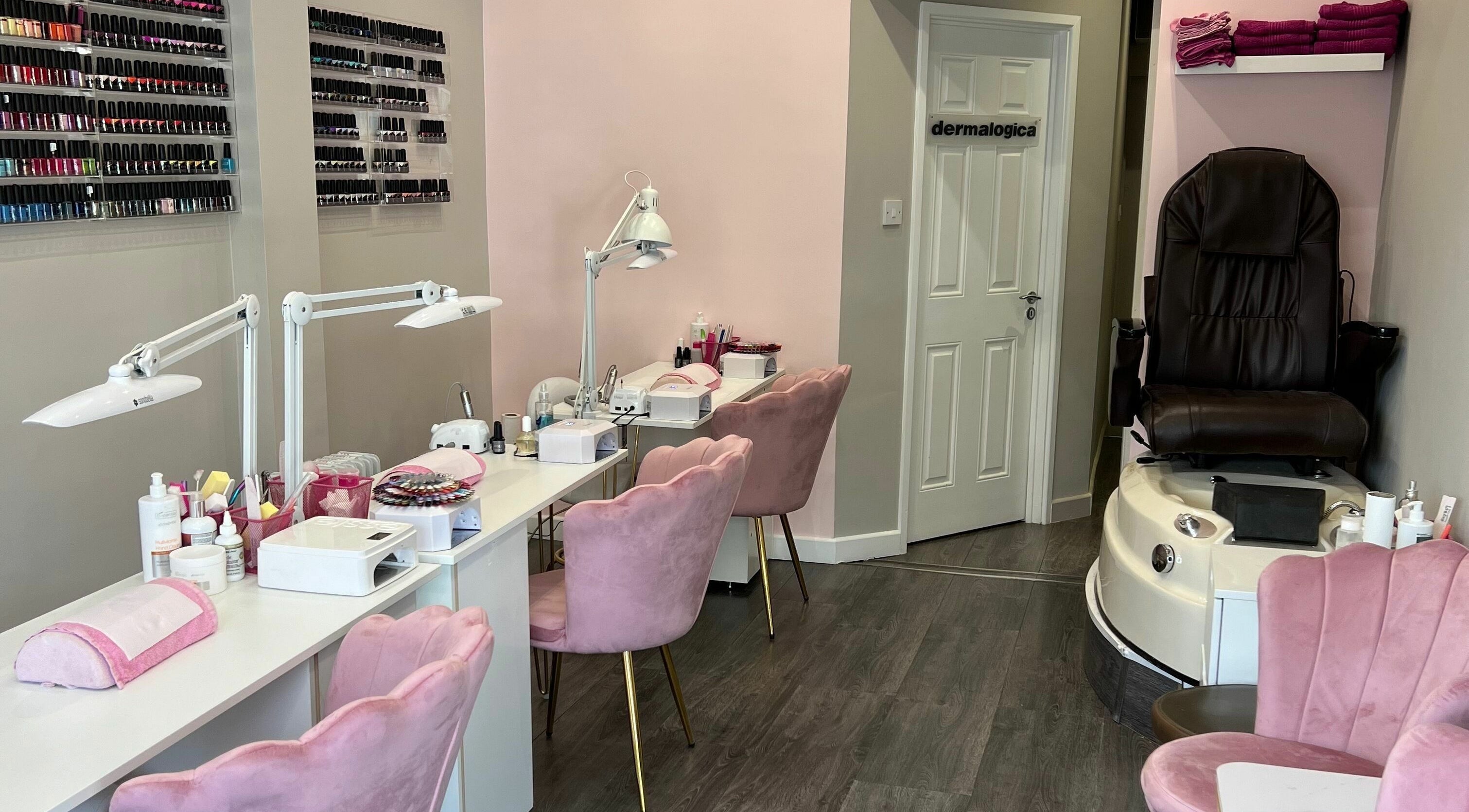 Beautify Salon in Dublin, County Dublin, IE. Chic nail and pedicure station with pink chairs and elegant decor.