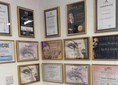 Certification wall at Lash Eyelashes, Southampton, England, GB showcasing beauty and wellness accolades.