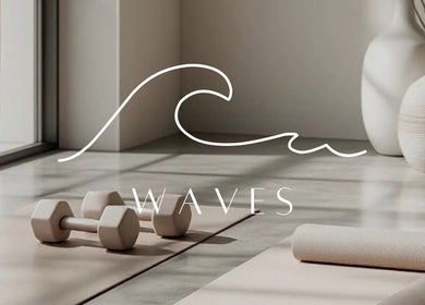 Serene yoga space at W A V E S in Kralendijk, Bonaire, BQ, featuring yoga mats and dumbbells amid natural light.