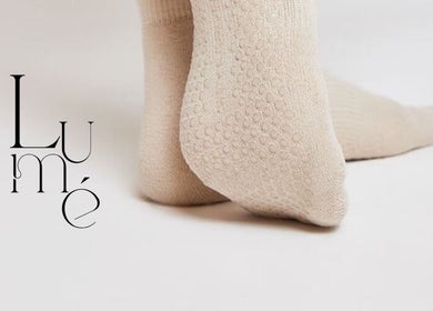 Elegant sock feet at LUMÉ, Kralendijk, Bonaire, BQ highlighting light beauty balance.