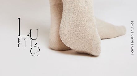 Elegant sock feet at LUMÉ, Kralendijk, Bonaire, BQ highlighting light beauty balance.