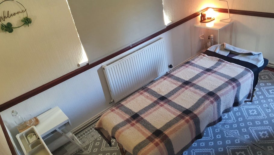 Tranquil therapy room at HEBS - Forden, Welshpool, Kingswood, Forden, Wales, GB with cozy massage table.