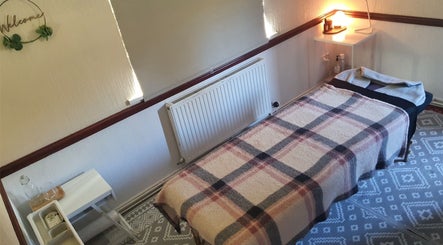 Tranquil therapy room at HEBS - Forden, Welshpool, Kingswood, Forden, Wales, GB with cozy massage table.