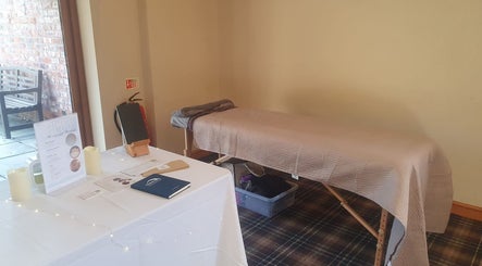 HEBS - Forden, Welshpool massage room with table and decor. Kingswood, Forden, Wales, GB venue ambiance.