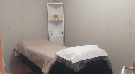 Peaceful massage room at HEBS - Forden, Welshpool, located in Kingswood, Forden, Wales, GB, featuring a cozy treatment bed.