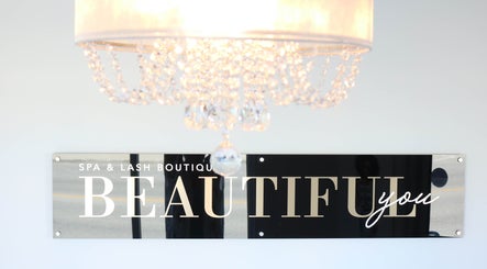 Beautiful You Spa & Lash Boutique sign with chandelier in Tillsonburg, Ontario, CA.