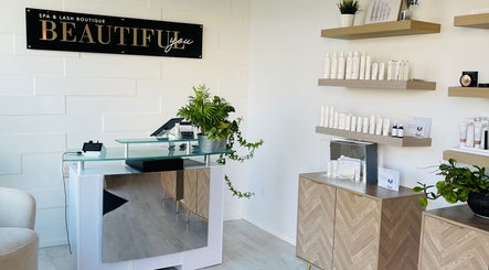 Welcome area at Beautiful You Spa & Lash Boutique in Tillsonburg, Ontario, CA, with product displays and plants.