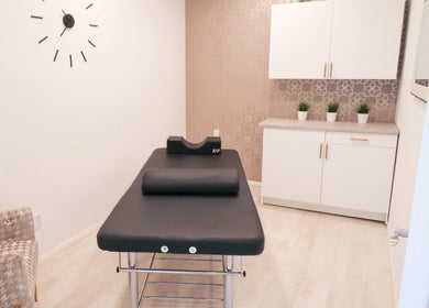 Cozy treatment room at Beautiful You Spa & Lash Boutique in Tillsonburg, Ontario, CA, featuring a modern bed.