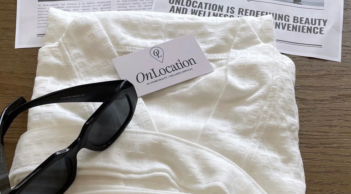Essentials for OnLocation - Verve Aspen Woods at Calgary, Alberta, CA: sunglasses, white fabric, business card.