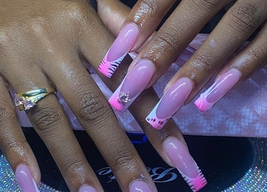 Elegant pink nail art at Naileditby_des in Paulsboro, New Jersey, US showcasing intricate designs.