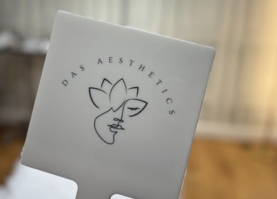 Elegant signage of DAS Aesthetics, located in London, England, GB, highlighting artistic logo design.