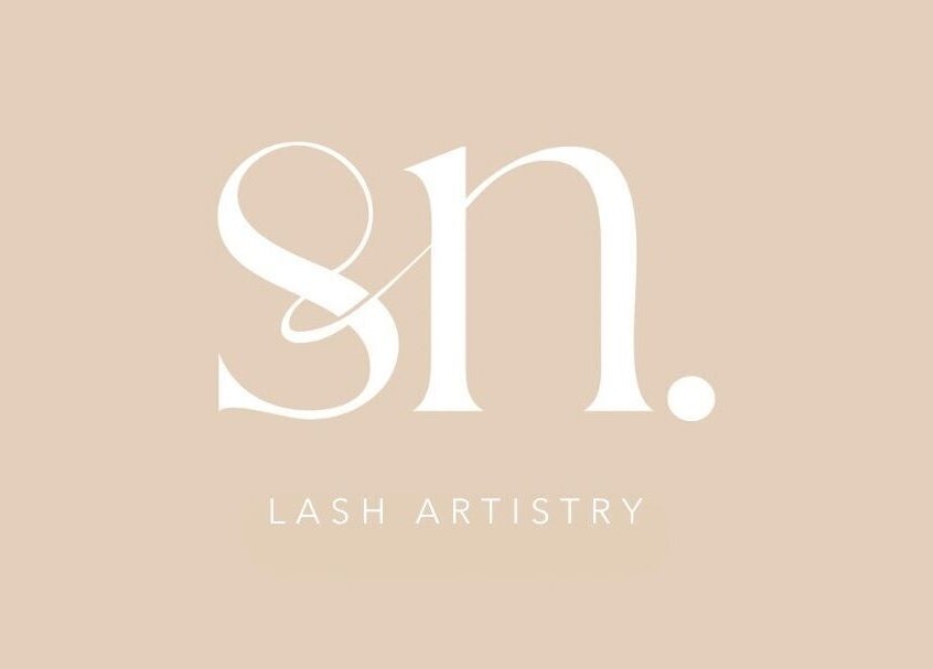 Stylish logo of SN Lash Artistry in Gregory Hills, New South Wales, AU against a soft beige background.