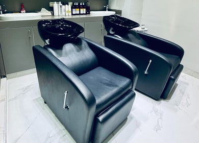 Modern wash stations at Big City Barbershop, Dubai, Dubai, AE, offering premium hair care services.