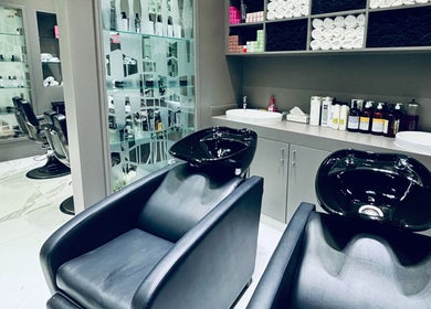 Modern wash basins and barber chairs at Big City Barbershop, Dubai, Dubai, AE, ideal for luxury grooming.
