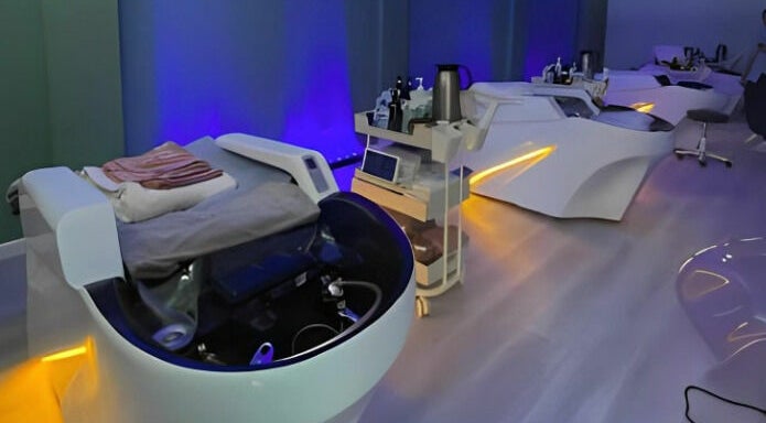 Relaxing spa beds in Am Perfect Spa, Aurora, Illinois, US, with ambient lighting and modern design.