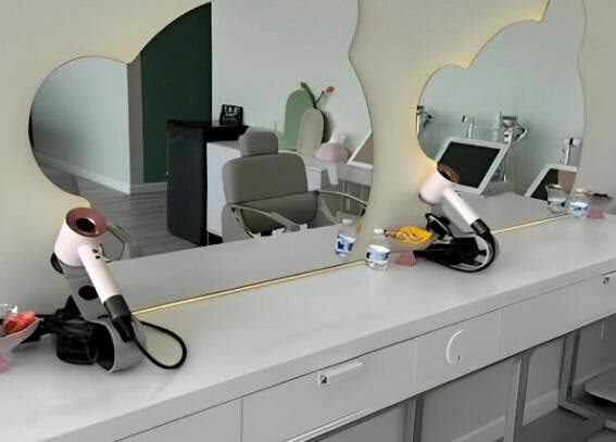 Modern beauty station with mirrors at Am Perfect Spa in Aurora, Illinois, US, featuring sleek styling tools.